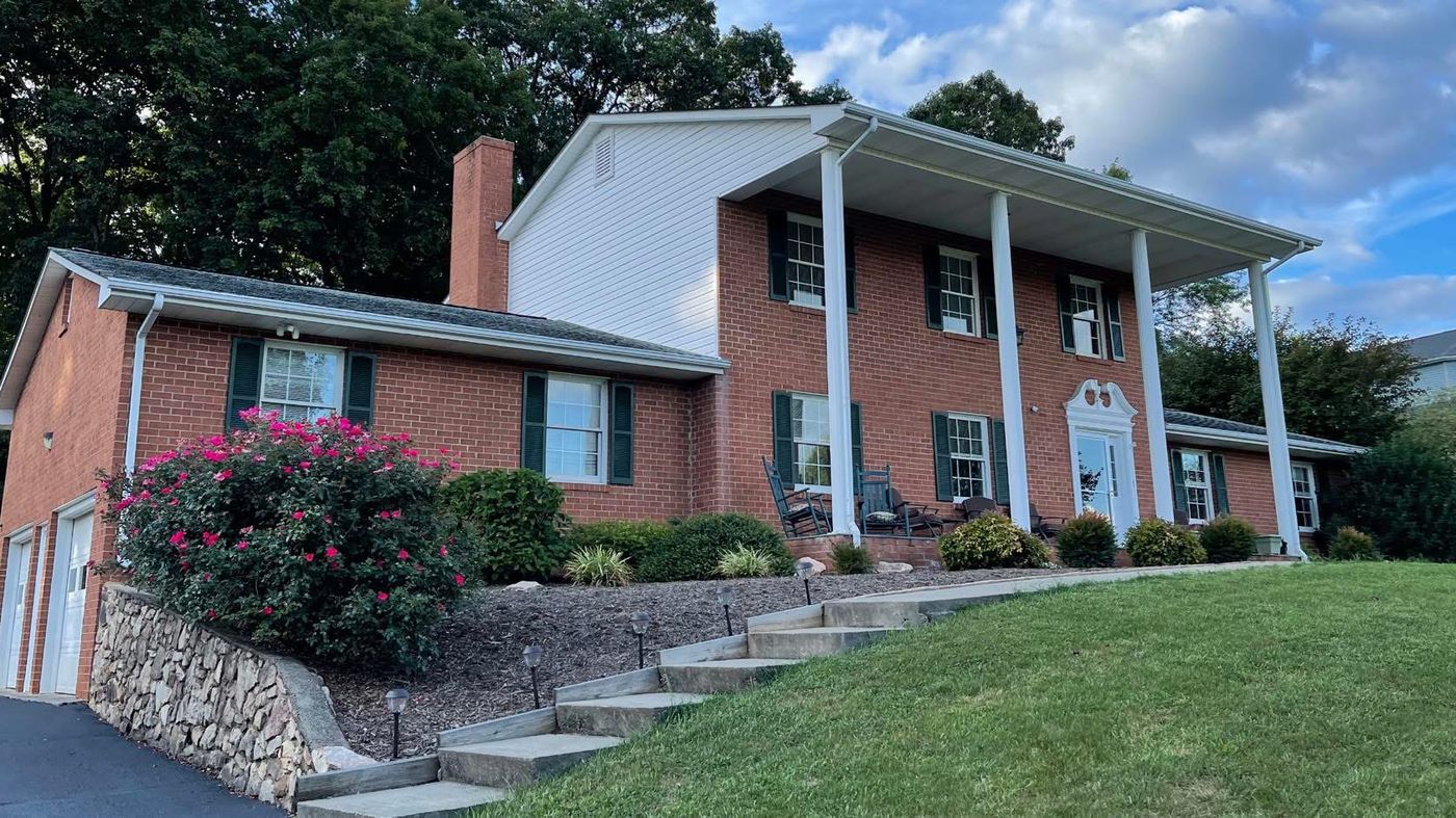 Brick colonial home with clean windows