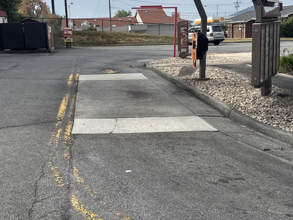 The same drive-thru pad after pressure washing